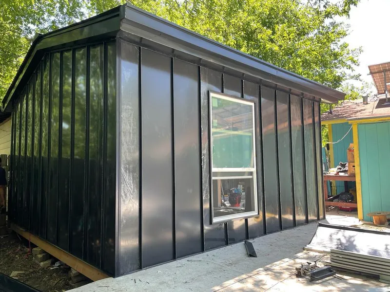 Black standing seam metal wall panels for Roof Inspection in Middleburg Heights