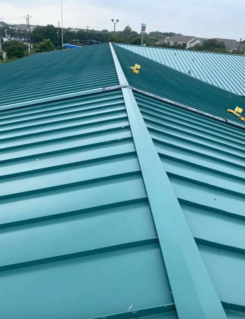 Green commercial metal roof ridge and valley for Metal Roof Repair in Middleburg Heights
